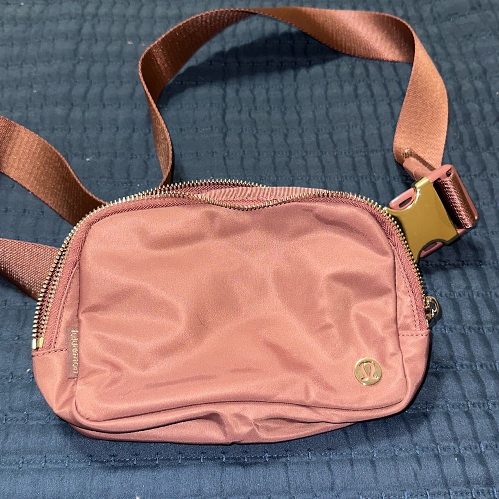 Lululemon blush and gold metallic hardware belt bag